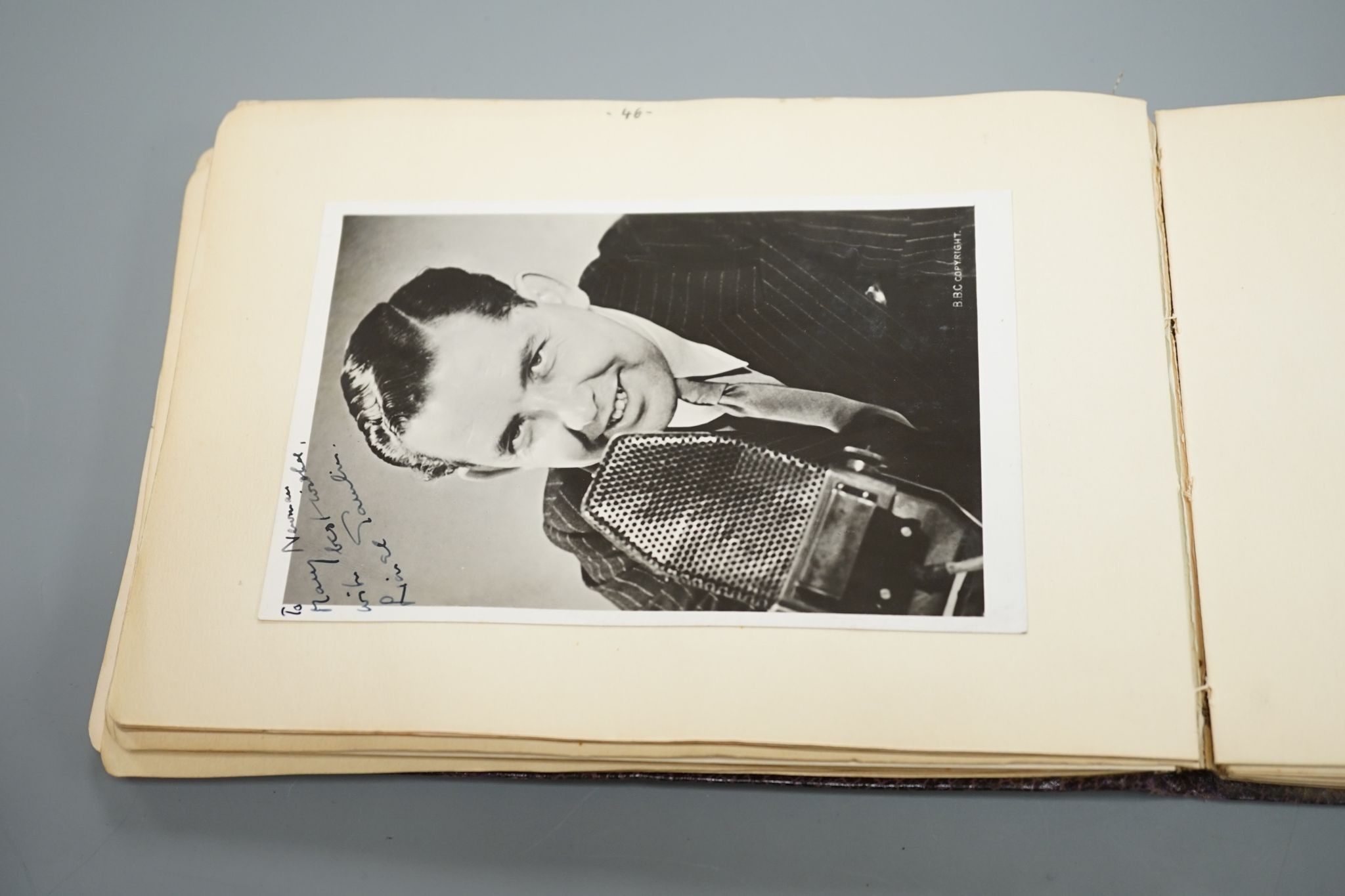 A 1930-40's autograph album including Judy Garland, Spencer Tracy, Basil Rathbone etc. and a photo album